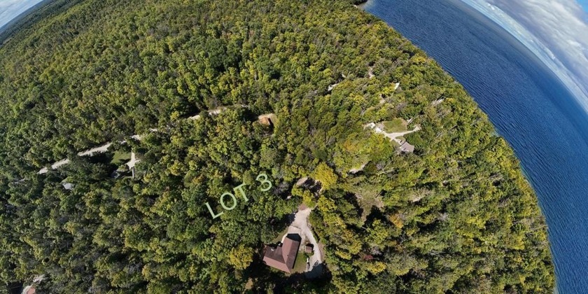 Nestled at the northern tip of the peninsula, this serene - Beach Lot for sale in Gills Rock, Wisconsin on Beachhouse.com