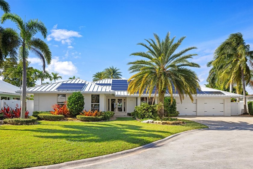 Experience refined waterfront living in this exceptional estate - Beach Home for sale in Fort Lauderdale, Florida on Beachhouse.com