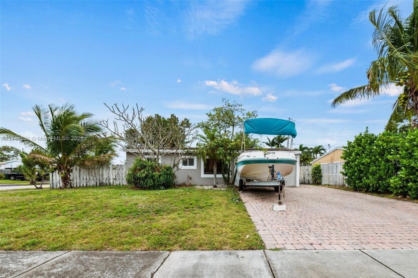 Welcome to this stunning 3-bedroom, 2-bathroom corner lot home - Beach Home for sale in Oakland Park, Florida on Beachhouse.com