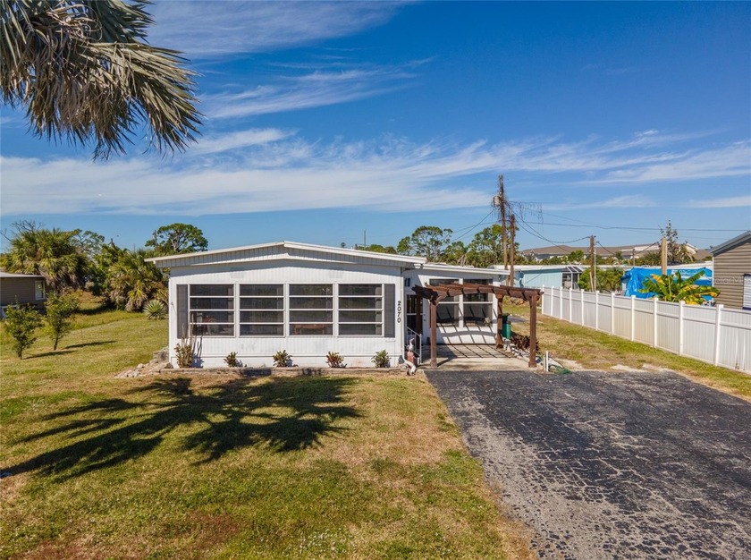 Experience the ultimate Florida lifestyle with this spacious - Beach Home for sale in Englewood, Florida on Beachhouse.com