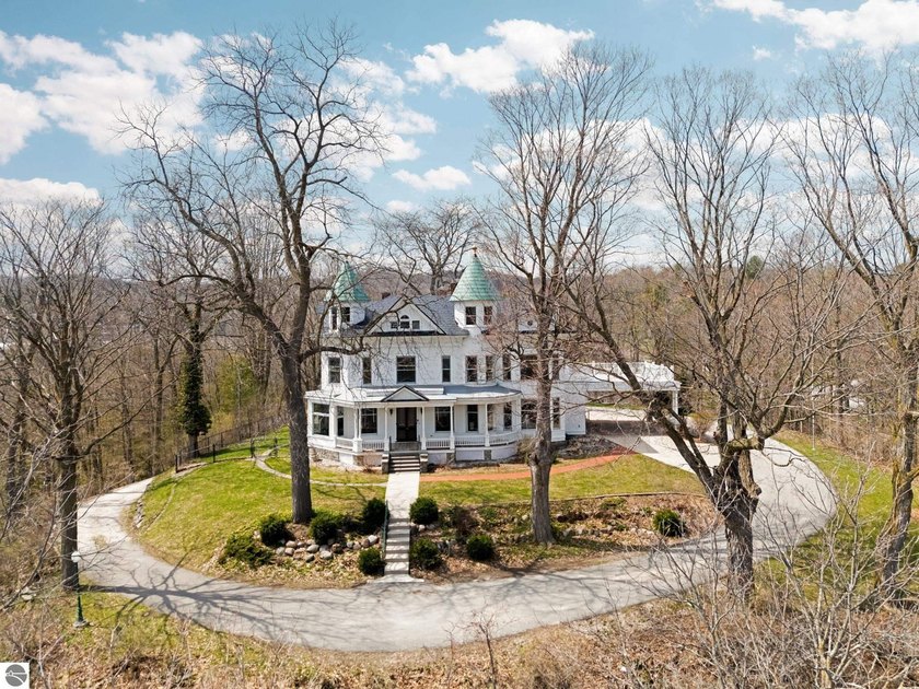 Set high atop Jefferson Hill with commanding, panoramic views of - Beach Home for sale in Traverse City, Michigan on Beachhouse.com