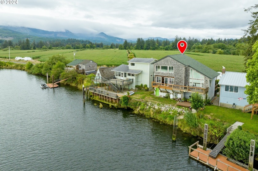 Discover your dream home nestled along the Nehalem River. This - Beach Home for sale in Nehalem, Oregon on Beachhouse.com