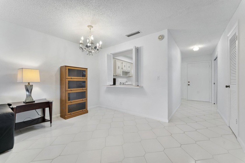 This charming 2-bedroom, 2-bathroom condo is the perfect blend - Beach Condo for sale in Delray Beach, Florida on Beachhouse.com