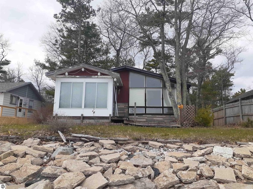 Unlock the potential of this rare Lake Huron opportunity! - Beach Home for sale in Oscoda, Michigan on Beachhouse.com