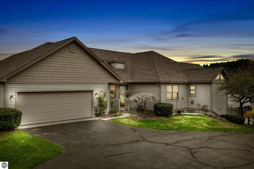 Golf course living with sunset views and effortless Northern - Beach Condo for sale in Traverse City, Michigan on Beachhouse.com