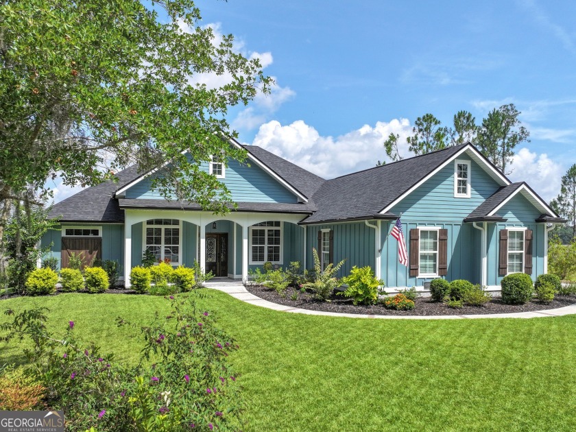 THIS STUNNING FOUR-BEDROOM, THREE-AND-A-HALF-BATH CUSTOM HOME IS - Beach Home for sale in Saint Marys, Georgia on Beachhouse.com