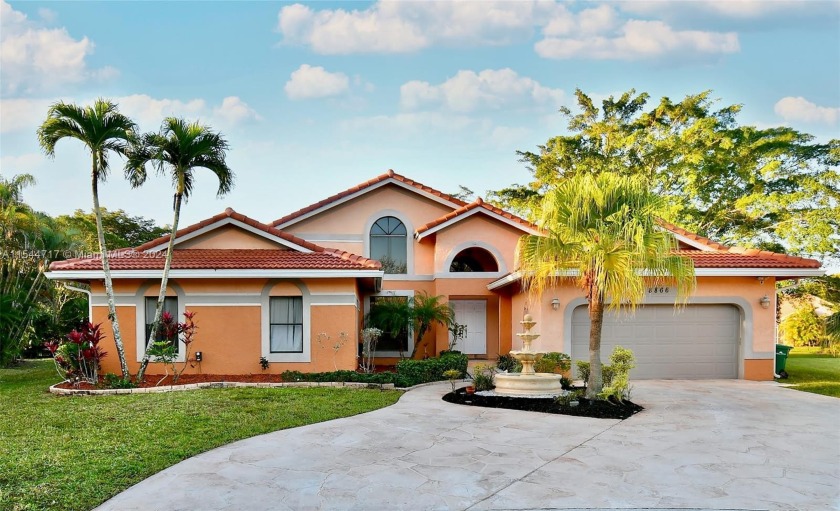 THIS IS THE DREAM ONE!! Beautiful 5-bedroom, 3-bath with - Beach Home for sale in Coral Springs, Florida on Beachhouse.com