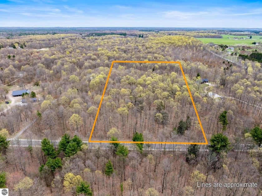 Discover this stunning 10-acre wooded parcel in the heart of - Beach Acreage for sale in Traverse City, Michigan on Beachhouse.com