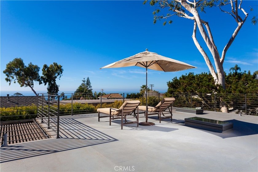 Set down a long drive on a generously sized street-to-street - Beach Home for sale in Laguna Beach, California on Beachhouse.com