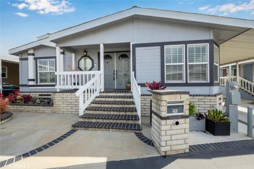 This 55/18+ community home really delivers, situated in the - Beach Home for sale in Huntington Beach, California on Beachhouse.com