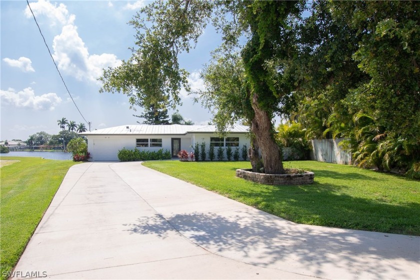 Experience waterfront living at its finest with this fully - Beach Home for sale in Fort Myers, Florida on Beachhouse.com