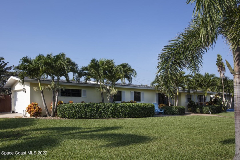 Professionally landscaped 1/3 acre corner lot in the heart of - Beach Home for sale in Cocoa Beach, Florida on Beachhouse.com