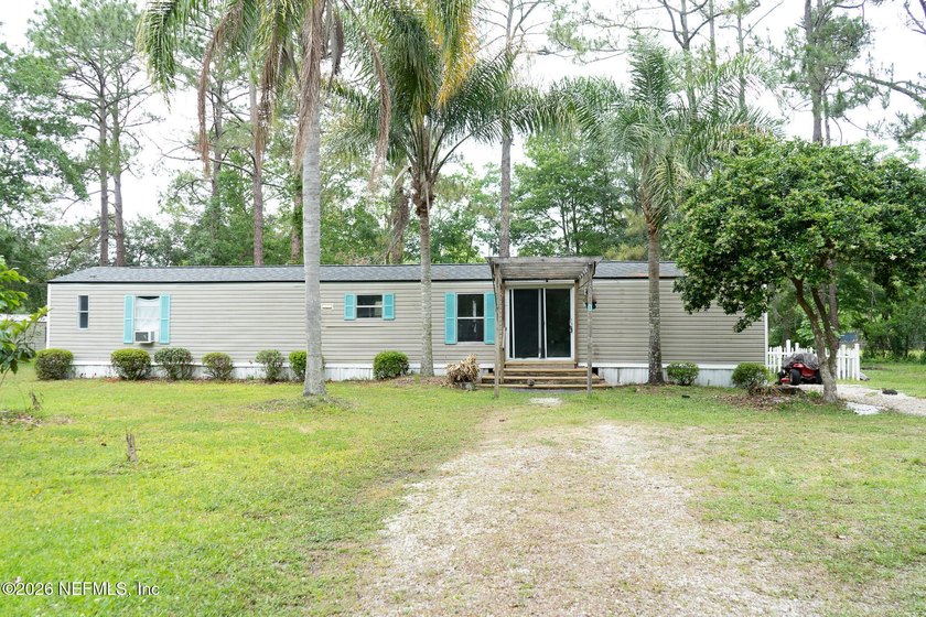 Enjoy peaceful country living in the desirable World Golf - Beach Home for sale in St Augustine, Florida on Beachhouse.com