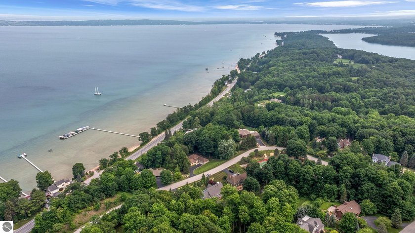 Located in the desirable La Riviera West community, this - Beach Home for sale in Traverse City, Michigan on Beachhouse.com