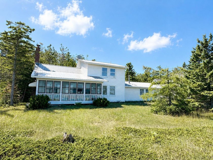 114 feet of sandy Hammond Bay frontage on Lake Huron! This - Beach Home for sale in Ocqueoc, Michigan on Beachhouse.com