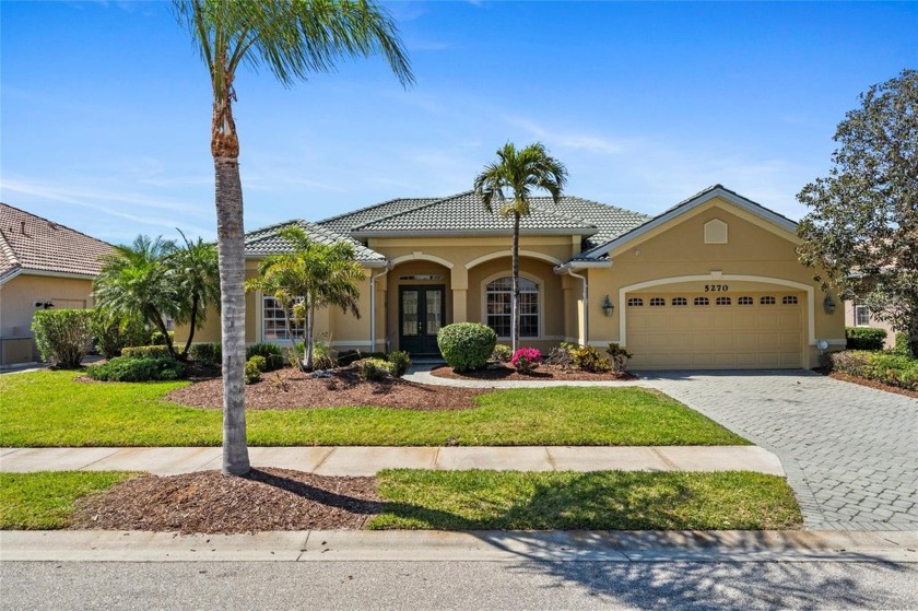 Welcome to 5270 White Ibis Drive, a stunning residence nestled - Beach Home for sale in North Port, Florida on Beachhouse.com