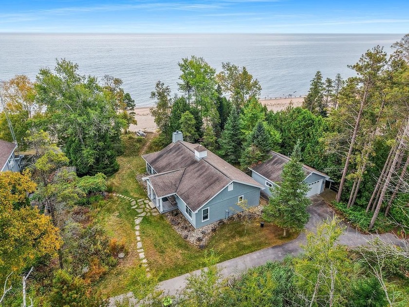 Charming waterfront home with SAND BEACH! Discover the perfect - Beach Home for sale in Sturgeon Bay, Wisconsin on Beachhouse.com