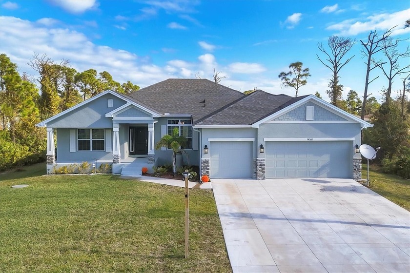 Welcome to this spacious 4-bedroom home with a den and a highly - Beach Home for sale in Port Charlotte, Florida on Beachhouse.com