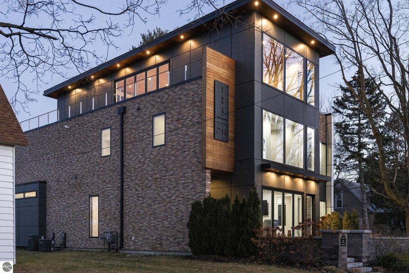 Few properties stop you in your tracks. This one does.  Set on - Beach Home for sale in Traverse City, Michigan on Beachhouse.com