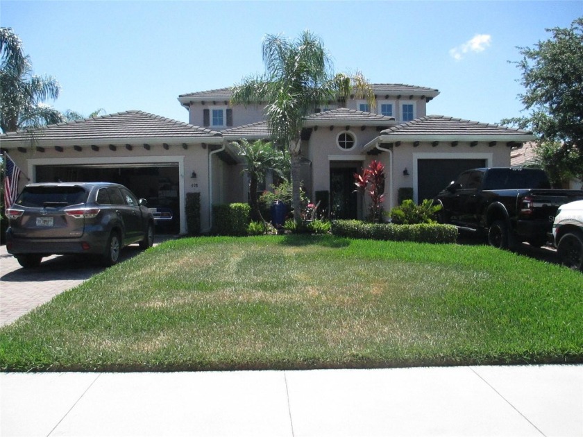 Captivatingly beautiful drive past the marina is this exquisite - Beach Home for sale in Bradenton, Florida on Beachhouse.com