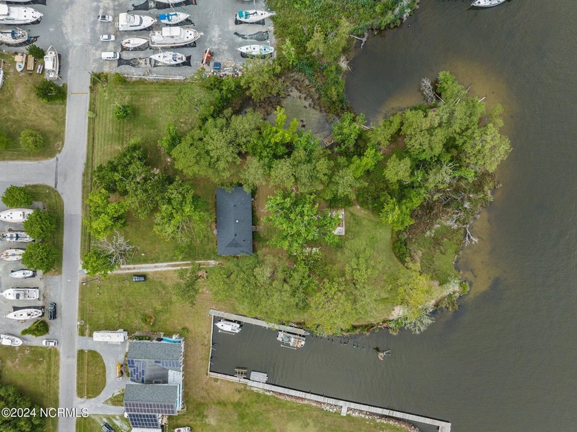 Situated in an MULTIPLE USE (MU) zone within the village of - Beach Home for sale in Oriental, North Carolina on Beachhouse.com