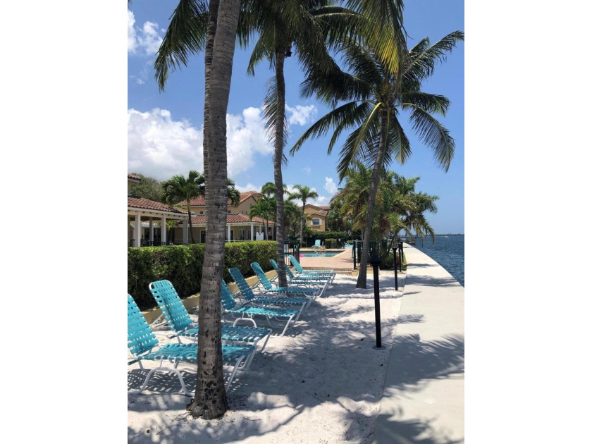 Tropical intracoastal living at this gated waterfront community - Beach Condo for sale in West Palm Beach, Florida on Beachhouse.com