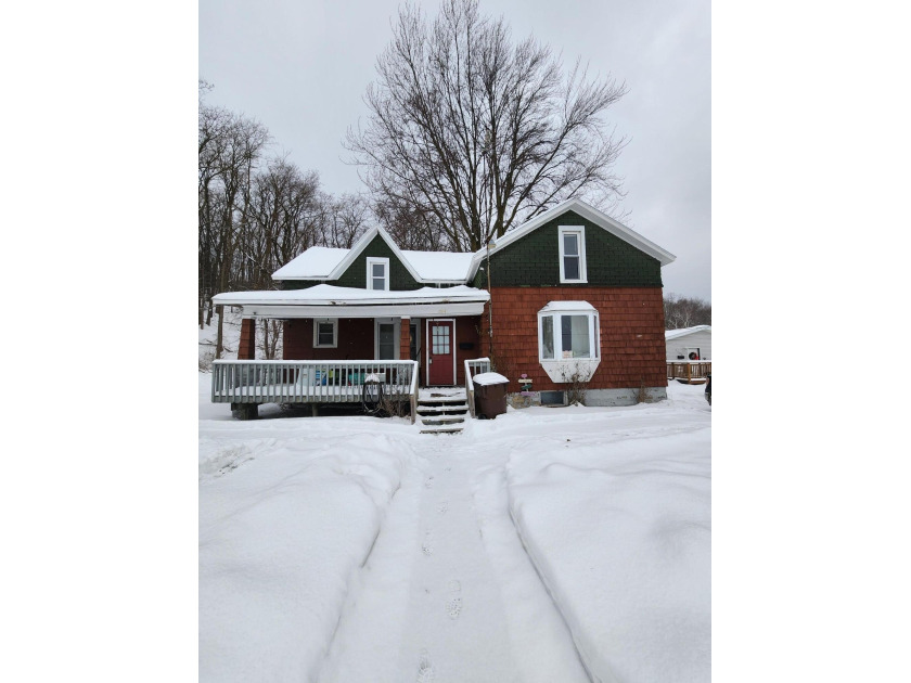 Discover what is possible on Main Street! This well maintained - Beach Home for sale in Manistee, Michigan on Beachhouse.com