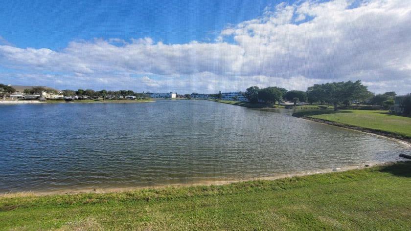 Beautiful expansive lake views from this 2-bedroom, 2 full baths - Beach Condo for sale in West Palm Beach, Florida on Beachhouse.com