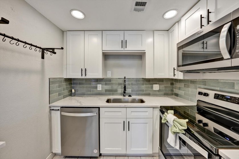 ONE OF THE LOWEST PRICED DESIRABLE 1ST FLOOR RENOVATED HOMES - Beach Condo for sale in West Palm Beach, Florida on Beachhouse.com