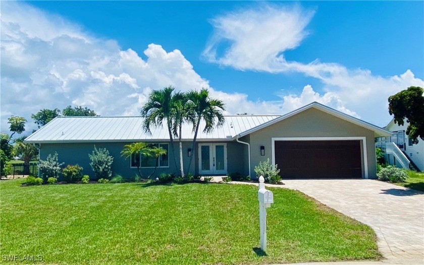 Welcome to 1073 Sand Castle Rd -- a fully renovated - Beach Home for sale in Sanibel, Florida on Beachhouse.com