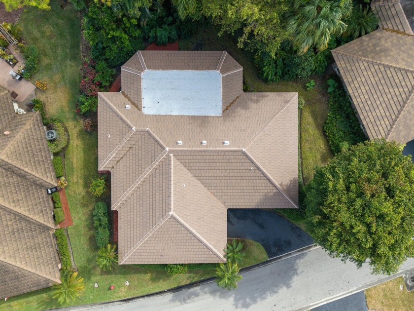 NEW ROOF 2024! NEW IMPACT GLASS COMPLETED IN DECEMBER 2024 - Beach Home for sale in Atlantis, Florida on Beachhouse.com