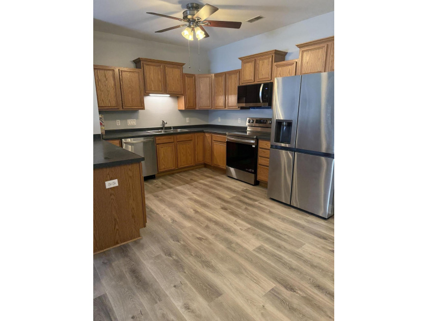 Welcome to this highly sought-after first-floor corner condo - Beach Condo for sale in Mount Pleasant, Wisconsin on Beachhouse.com