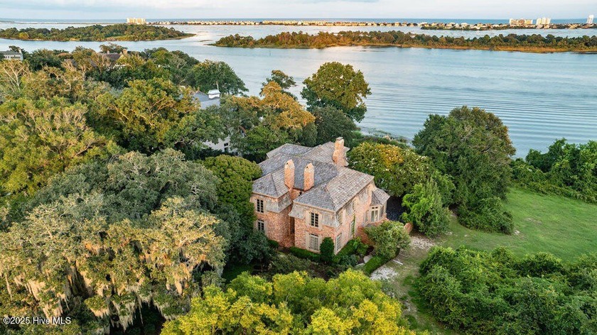 Framed by moss draped centuries old live oaks, this custom built - Beach Home for sale in Wilmington, North Carolina on Beachhouse.com