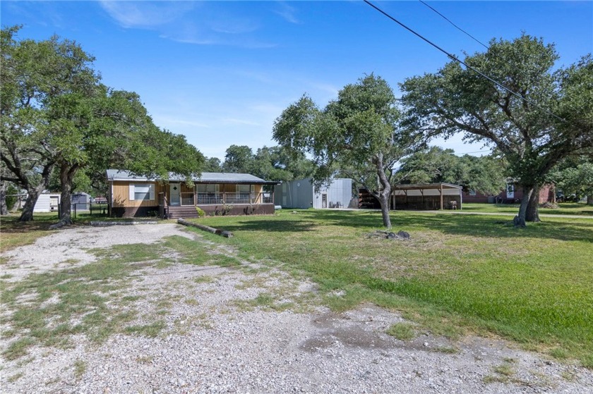 MOBILE HOME PLUS DETACHED WORKSHOP AND APARTMENT!! Check out - Beach Home for sale in Rockport, Texas on Beachhouse.com