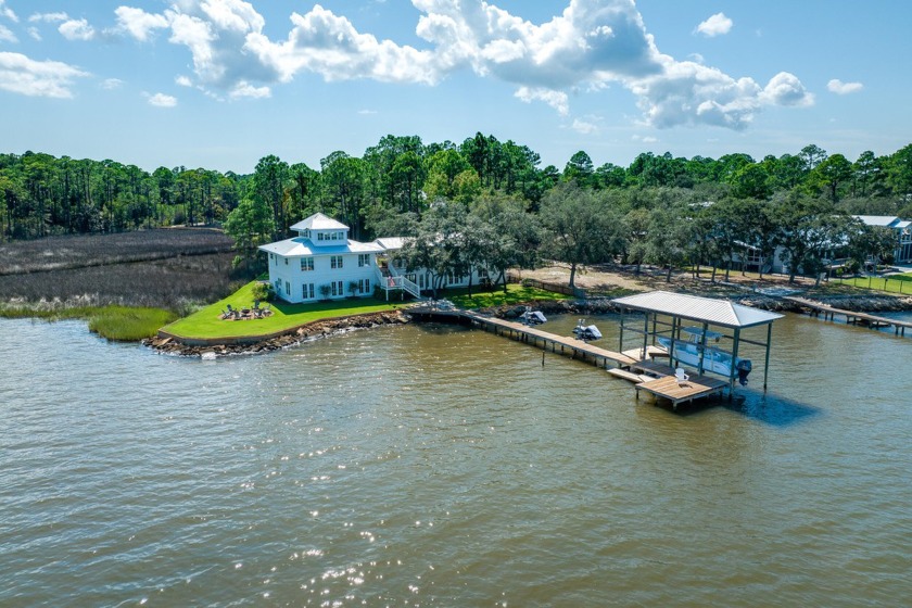 Nestled along the shores of the Choctawhatchee Bay, this - Beach Home for sale in Santa Rosa Beach, Florida on Beachhouse.com