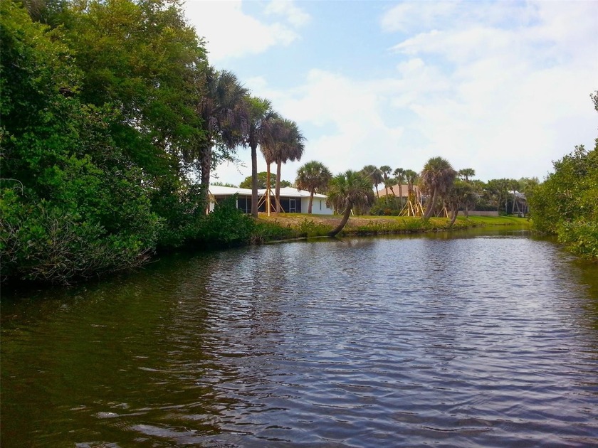 Set in a tropical oasis of mature landscaping this charming and - Beach Home for sale in Placida, Florida on Beachhouse.com