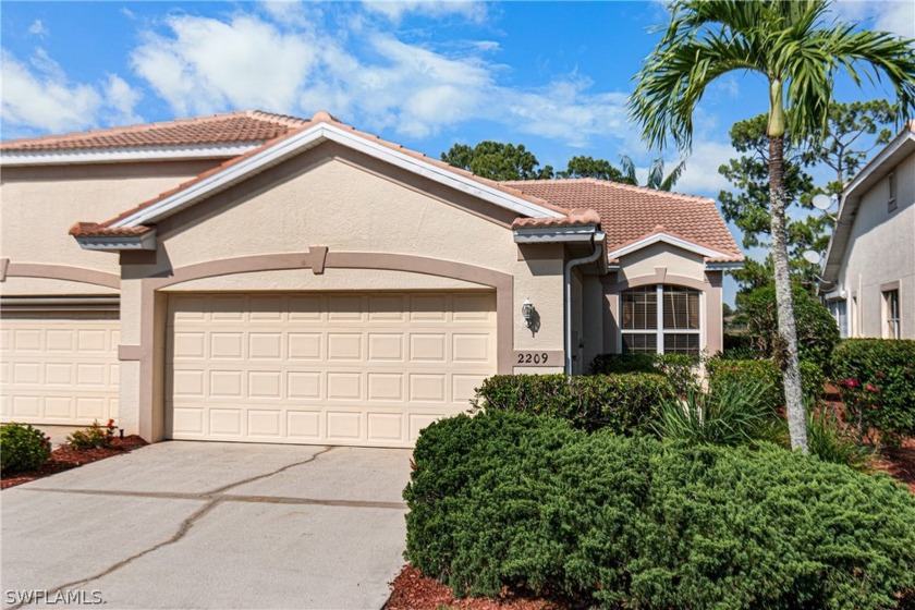 This exquisite villa is nestled in one of the most sought after - Beach Home for sale in Lehigh Acres, Florida on Beachhouse.com