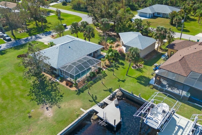 Discover exceptional waterfront living in the desirable Gulf - Beach Home for sale in Port Charlotte, Florida on Beachhouse.com