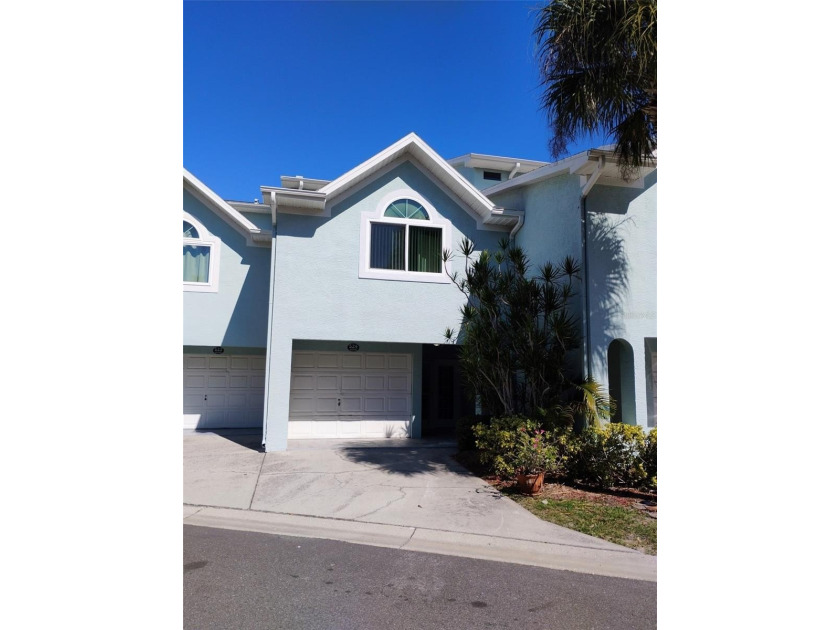 Welcome to your dream townhome within a serene waterfront - Beach Townhome/Townhouse for sale in Indian Rocks Beach, Florida on Beachhouse.com