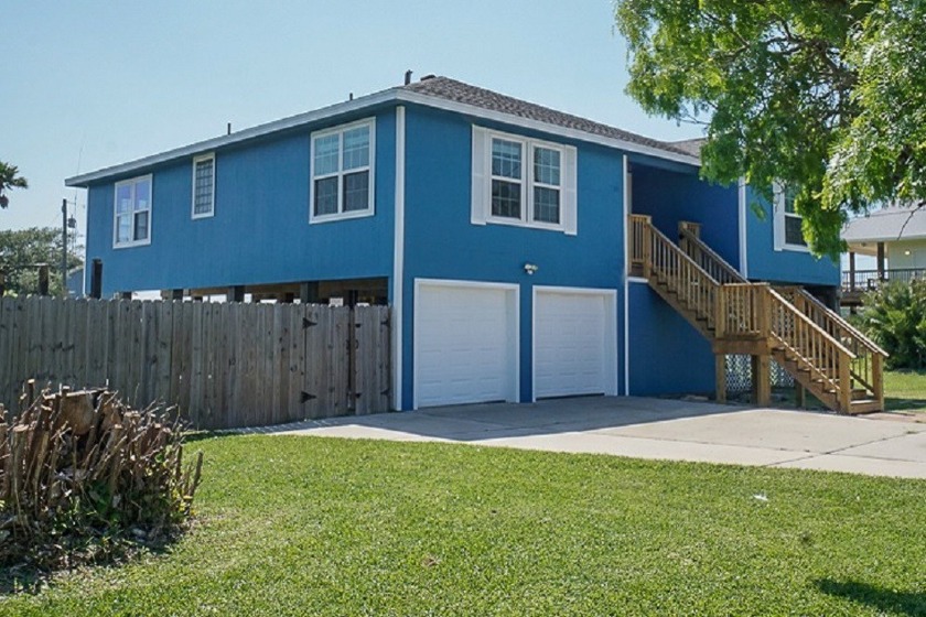 This open-concept 4/2 home on stilts and a double lot with a - Beach Home for sale in Corpus Christi, Texas on Beachhouse.com