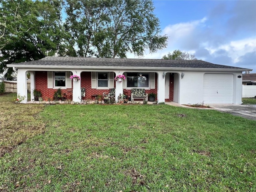 Welcome to this inviting 3 bedroom, 2 full bathroom home with an - Beach Home for sale in Dunedin, Florida on Beachhouse.com