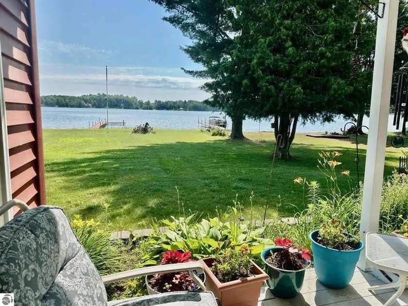 Beautiful all-brick lakefront home on Cedar Lake offering 3 - Beach Home for sale in Oscoda, Michigan on Beachhouse.com