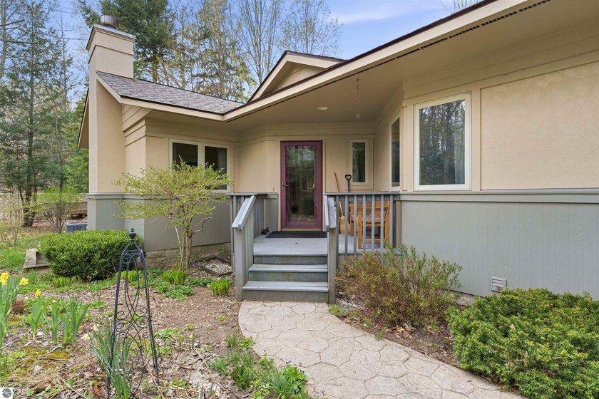 Tucked into the trees at the gateway to Leelanau County and - Beach Condo for sale in Traverse City, Michigan on Beachhouse.com