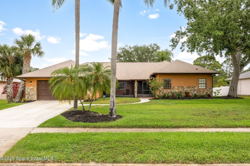 Discover this beautifully updated 3 bed, 2.5 bath home blending - Beach Home for sale in Merritt Island, Florida on Beachhouse.com