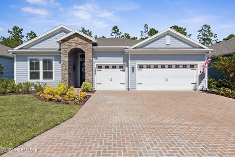 Discover modern elegance at 75188 Pondside Lane in gated 55+ - Beach Home for sale in Yulee, Florida on Beachhouse.com