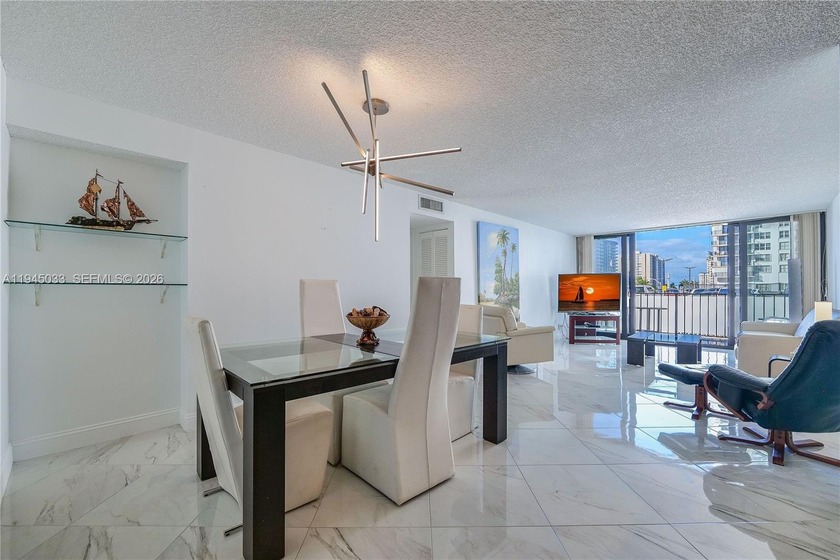 NICE SPACIOUS 2 BR/2 BA CORNER UNIT. FEATURES NEW IMPACT WINDOWS - Beach Condo for sale in Hollywood, Florida on Beachhouse.com
