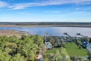 This beautiful custom built home is located in the small gated - Beach Home for sale in Townsend, Georgia on Beachhouse.com