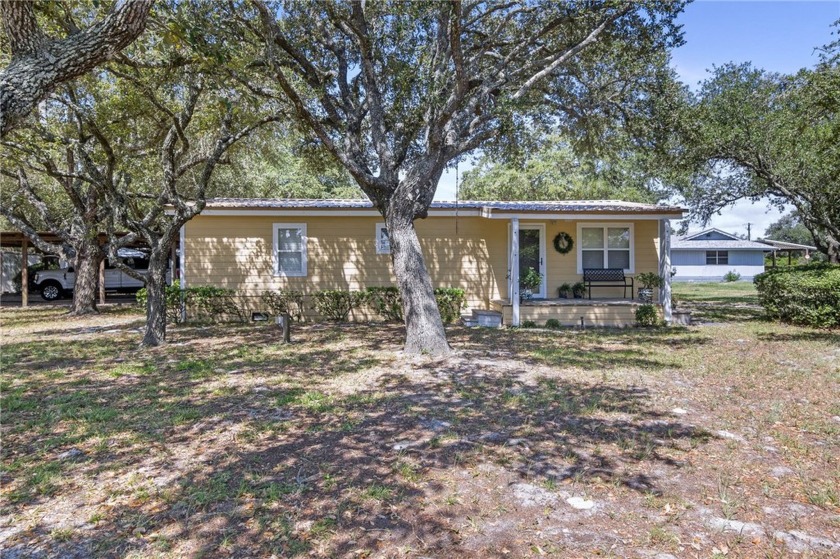 Beautiful Live Oaks Shade this more than meets the eye home on - Beach Home for sale in Rockport, Texas on Beachhouse.com