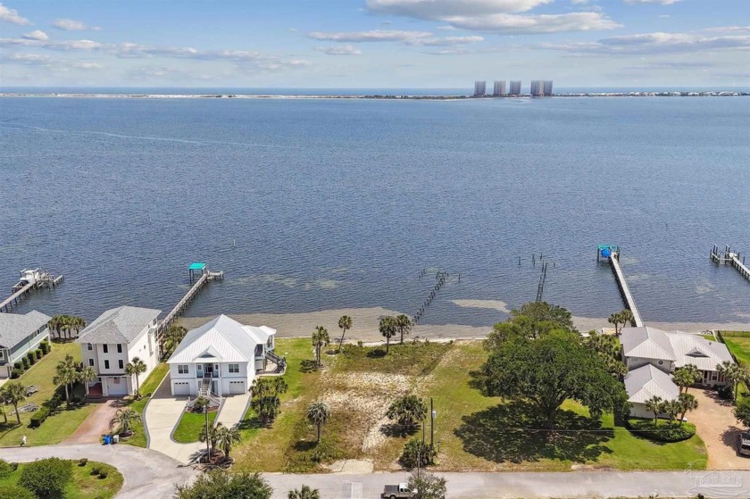 Discover the epitome of waterfront living on this remarkable - Beach Lot for sale in Gulf Breeze, Florida on Beachhouse.com