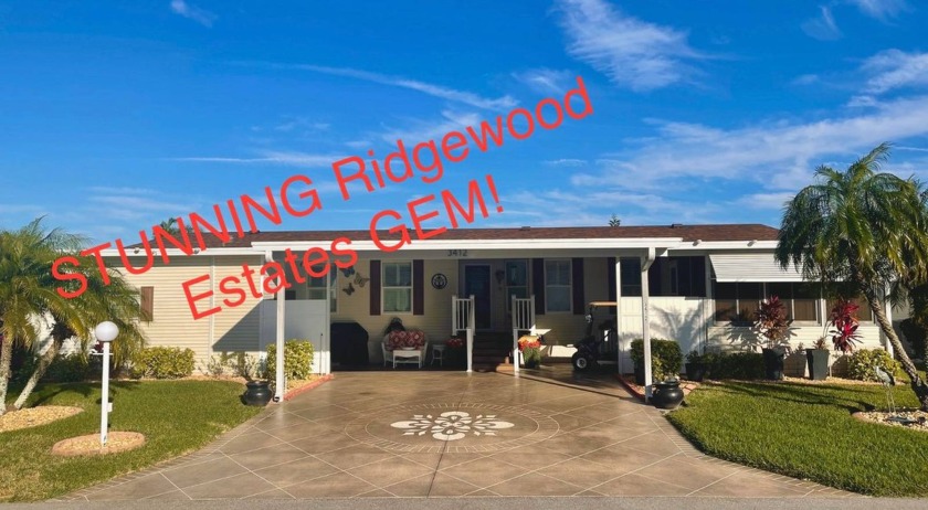 STUNNING Ridgewood Estates Palm Harbor GEM! This home has it all - Beach Home for sale in Ellenton, Florida on Beachhouse.com